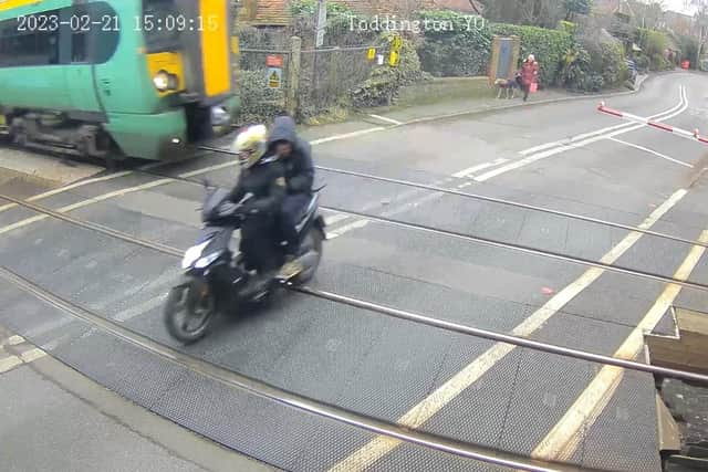 A moped is almost hit by a train at Toddington on a stretch of 70mph railway between Angmering and Ford/Littlehampton.