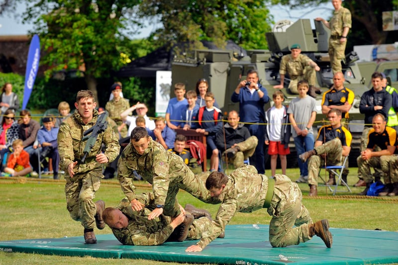 Commandos show how to surprise a 'man on guard duty' and to disarm him. 2015. Picture: Malcolm Wells (150528-8466)