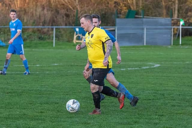 Jamie White, left, in action for Infinity during last weekend's win against Liphook. Picture by Kevin Steele.