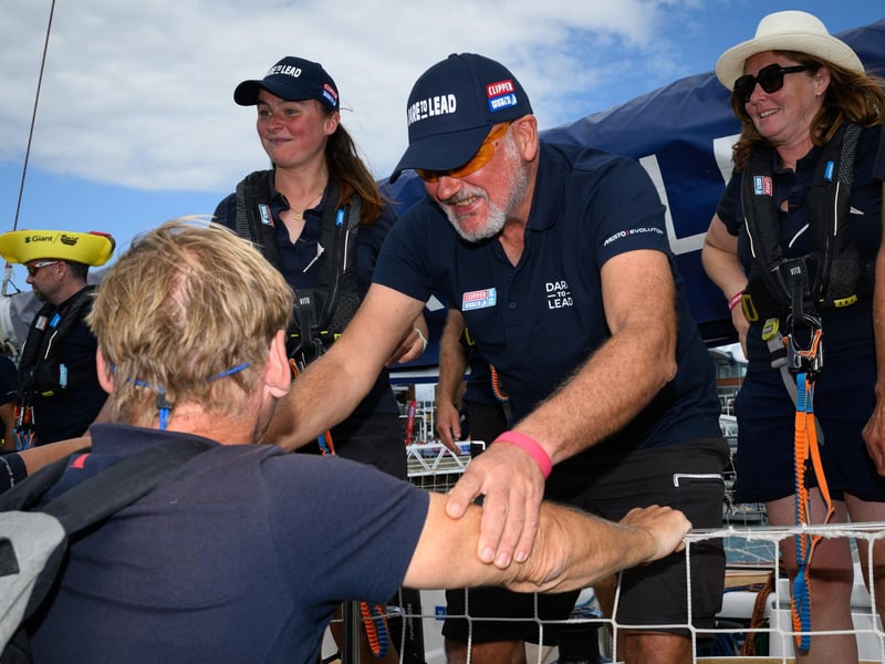 Crew members hug and greet family and friends.Picture: Keith Woodland (270721-12)