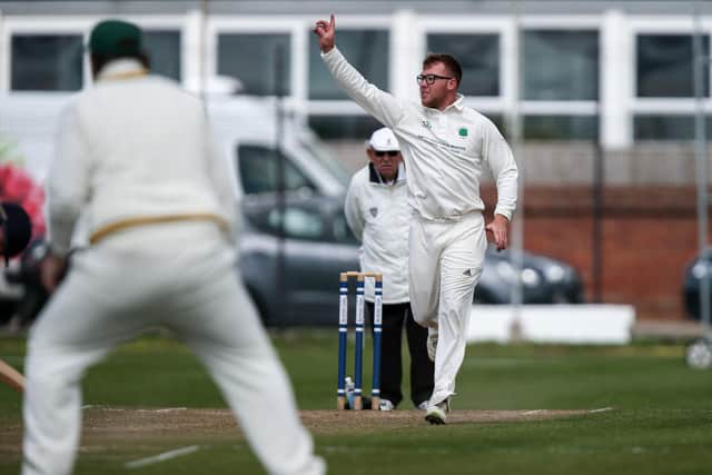 Bedhamptonâ€™s Tim Joy celebrates a wicket off his bowling. Portsmouth 2nds v Bedhampton 1sts, St HelensPicture: Chris Moorhouse   (290820-06)