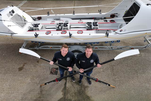 Chris Ayres, left, and Andrew Taw will race across the Atlantic in this boat in December
Picture: Chris Moorhouse     (110320-07)