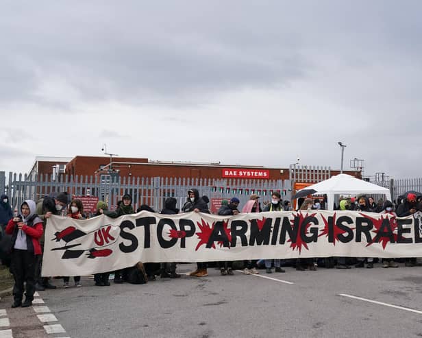 Trade unionists and protesters form a blockade outside weapons manufacturer BAE Systems in Rochester, Kent, in protest over the Israel-Gaza conflict and calling for an immediate ceasefire to halt the killing of civilians in Palestine. Picture: Gareth Fuller/PA Wire