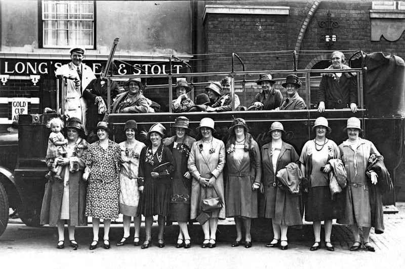 Ladies day out sometime in the 1920's, departing from the Southsea Cellars Public House.