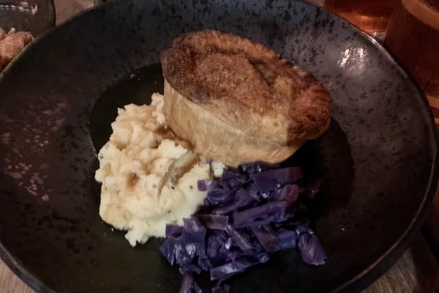 Shipwrecked steak and stilton pie with creamy mash, red cabbage and gravy.