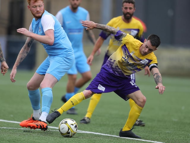 Action between Lenny's 11 vs United Minds FC.