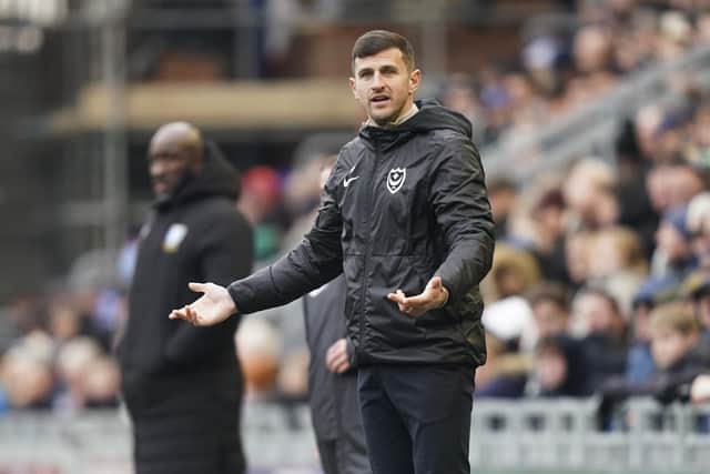 Pompey boss John Mousinho looks for answers from the sidelines