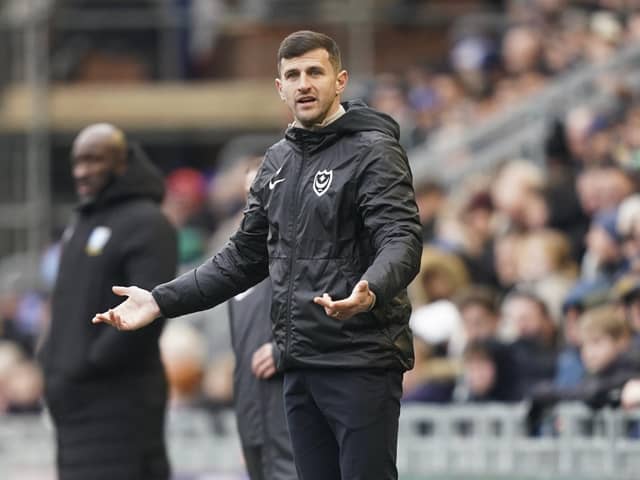 Pompey boss John Mousinho looks for answers from the sidelines