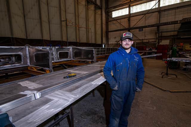 Alfie Kneale-Cohen near the hull of a hovercraft being made at Griffon Hoverwork factory
Picture: Habibur Rahman