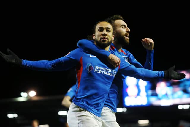 Marcus Harness celebrates scoring against MK Dons with Ben Close. Picture: Joe Pepler