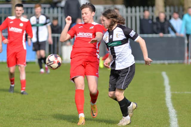 Horndean's Tommy Scutt, left, and Bemerton's Oscar Johnston. Picture by Martyn White