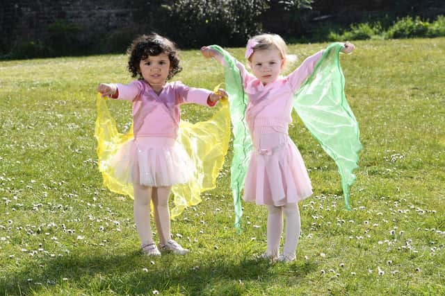 Bella Mendes and Florence Cutler both age 2 enjoying some social time before their Starz Ballet class outside in the sun.

Photo by: Paul Jacobs/pictureexclusive.com