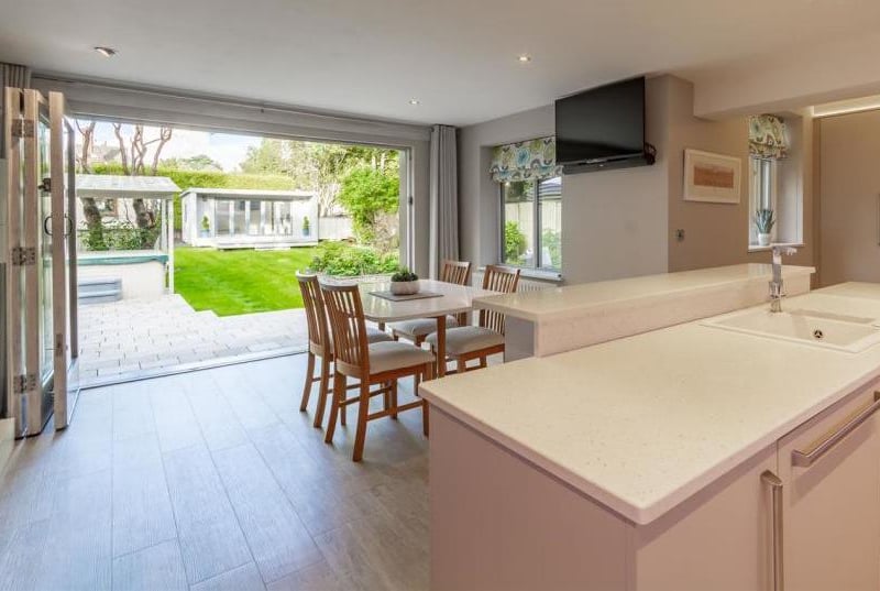 The kitchen/diner even boasts sliding doors that lead to the property's back garden. Pretty cool, eh?