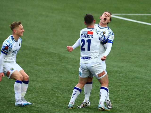 Sam Matthews, right, has just scored Hawks' late winner. Picture by Dave Haines