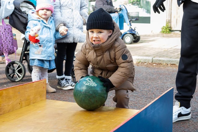 Locals braved the cold to celebrate the start of the Christmas festivites with a street party on Hayling Island on Saturday afternoon.

Pictured - Acer Lawrence, 3 practicing his bowling skills.

Photos by Alex Shute