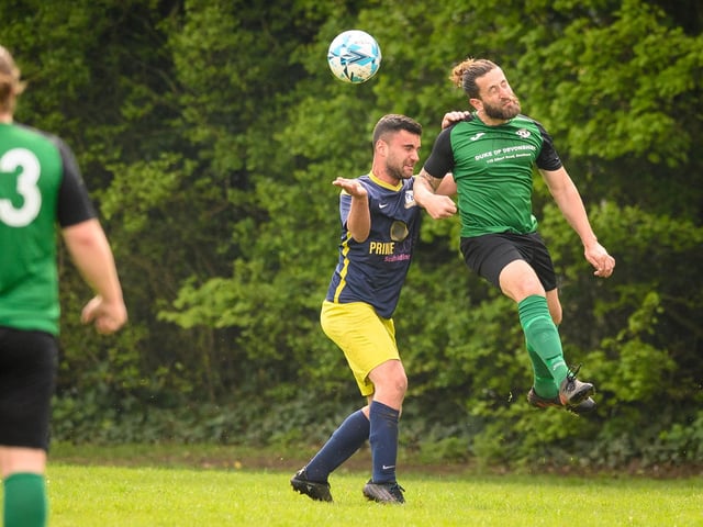 Action from Saturn Royale's 1-0 win over Pelham Arms (blue and yellow kit) in the second Adelaide Cup semi-final. Picture: Keith Woodland (300421-139)
