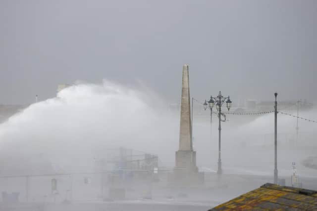 Storm Eunice swept in across Portsmouth, bringing with it a red weather warning and strong winds. Southsea Seafront saw large waves crashing against the sea walls. Photos by Alex Shute