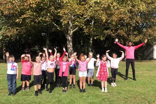 Havant mayor Prad Bains with Purbrook Junior School pupils supporting his Think Pink charity campaign.