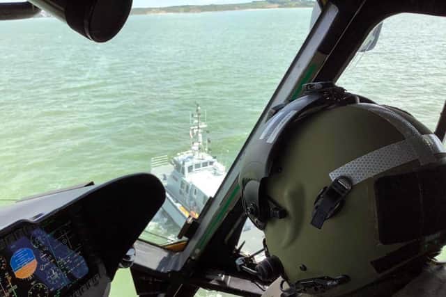 A view from above as a pilot approaches HMS Magpie in the Solent. Photo: Royal Navy
