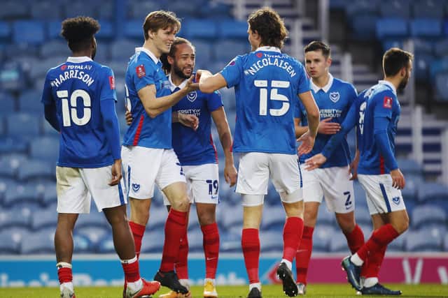 Portsmouth's Sean Raggett scores his first goal of the match
