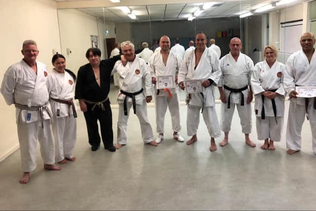 Karate instructor Bob Caruana was presented with a special gift for his 80th birthday from students past and present. Pictured: Bob, third from left, taken in 2019 after Bob's last student grading. This included the 3rd Dan Black belt grading for one of his lifelong students John Aquilina