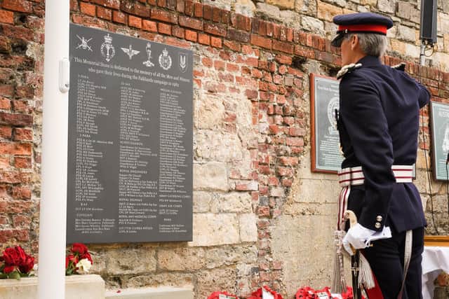 Pictured is: HM Lord-Lieutenant of Hampshire, Nigel Atkinson. salutes the new Falklands memorial.
Picture: Keith Woodland (190621-207)