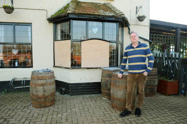 Damage caused after a car crashed into The Chairmakers in World's End on Saturday, February 27 around 9am.

Pictured is: Landlord of The Chairmakers Angus Reid.

Picture: Sarah Standing (010321-3893)