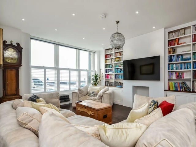 The listing says: "This individually architect designed home is accessed via its own front door leading to a foyer with feature architrave then into an outstanding open plan 37’ sitting room incorporating dining area and fully fitted kitchen to one end, it has a large double glazed sash windows to the front with remote control blinds and outstanding views towards the Solent."