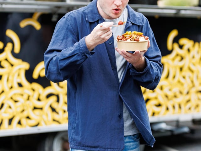 People enjoying food at Southsea Food Festival on Saturday