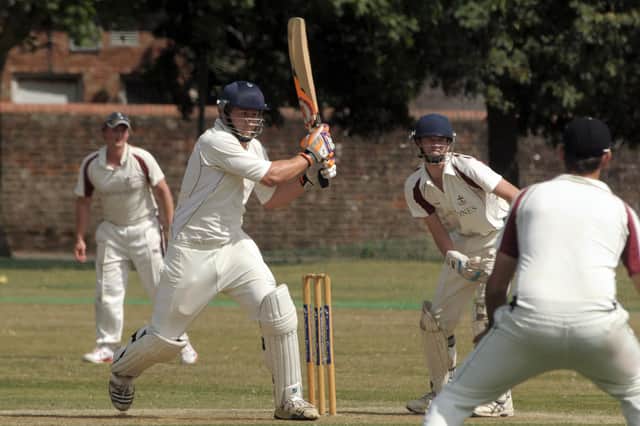 Cameron Prentice hits a boundary for  Havant II against St Cross Symondians II. The Winchester-based club have the most adult teams of any club affiliated to the Hampshire Cricket Board - eight. Picture: Mick Young
18/07/2015