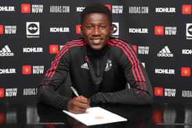 Manchester United defender Di'shon Bernard poses after signing a new contract at the Red Devils in July 2021     Picture: Matthew Peters/Manchester United via Getty Images