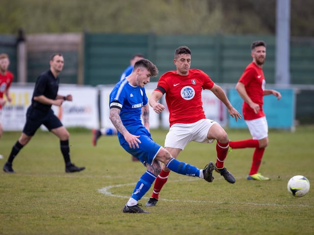 Action from Gosport Town's 4-0 victory over Lee Rangers (blue kit) in the Portsmouth & District FA Trophy final at Cams Alders. Picture: Alex Shute