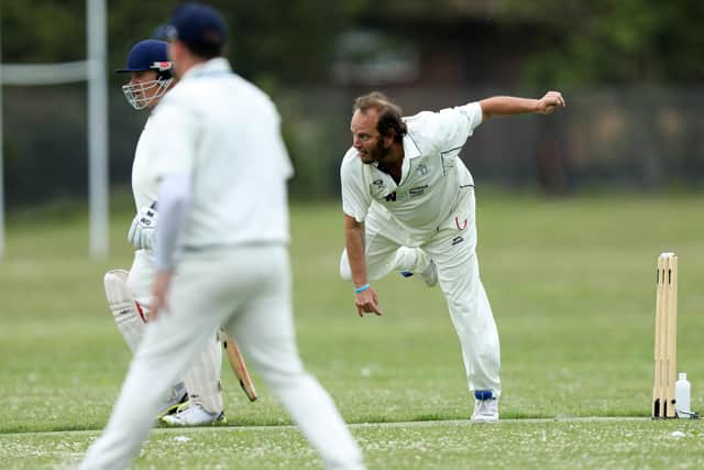 John Creamer bowling for Portsmouth Community. Picture: Chris Moorhouse
