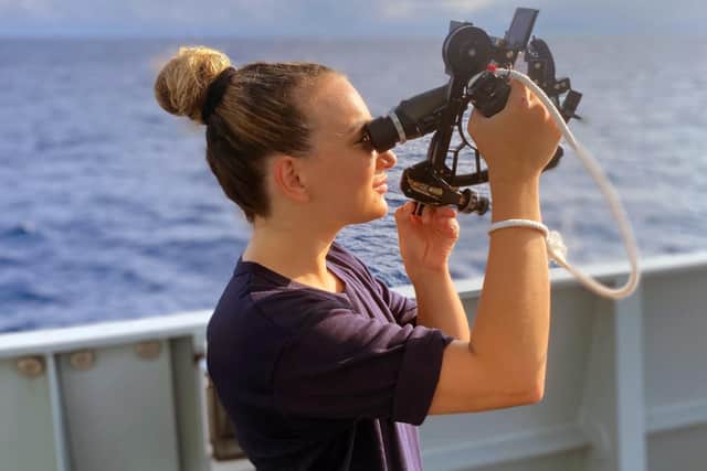 Cadet Scarlett Barnett-Smith taking a navigational fix aboard HMS Tamar.
Picture: Cadet Scarlet Barnett-Smith