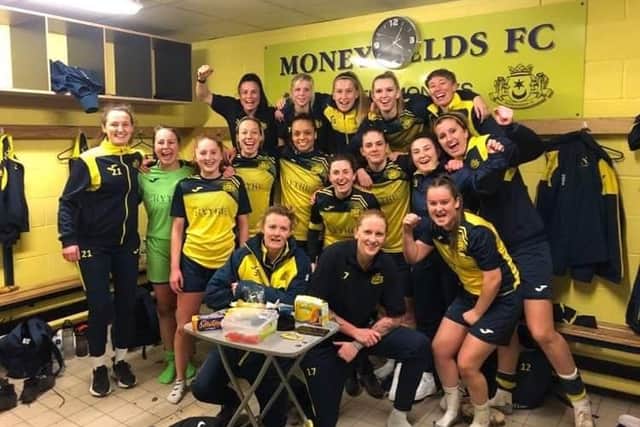 Moeyfields Women continue their Women's Hampshire FA Cup quarter-final celebrations in the dressing room