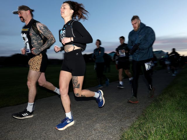 A number of runners took to the picturesque coastal route to take on the Portsmouth Coastal Waterside Marathon, Festive Half Marathon, as well as the Southsea 5k and 10k Turkey Trot. Picture: Chris  Moorhouse (221224-12)