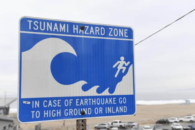 A tsunami hazard zone sign is displayed near a beach in El Segundo, California, on January 15, 2022. Picture: PATRICK T. FALLON/AFP via Getty Images