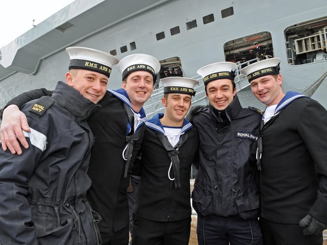 Taken from Victory Jetty as HMS Ark Royal came alongside for the last time into Portsmouth Naval Base 3rd December 2010. (left to right) Naval Ratings Rob Dutton (18) from Liverpool, Mike Pierce (29) from Bognor Regis, Sean Baldwin (24) from Havant, Paul Stockwell (30) from Blackpool, Simon Hart (27) from Southsea and Ashley Rea (22) from Fareham . Picture: Malcolm Wells 103921-3717