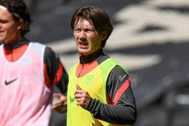 Alfie Stanley pictured during Pompey's warm-up against MK Dons in April 2021. Picture: Dennis Goodwin/ProSportsImages