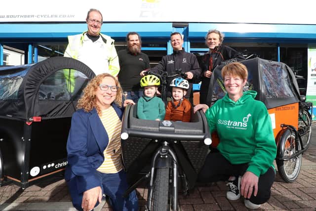 Back, from left, Adrian Saunders, Chandler Brujo, Kevin Watkin, Nicholas Sebley and front Cllr Suzy Horton, 2-year-old twins Austin and Toby Bush and Jenni Jones.
Picture: Stuart Martin (220421-7042)