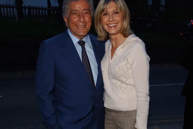 File photo dated 05/04/05 of Tony Bennett and Olivia Newton John arriving at the Tony Bennett Art Exhibition Launch, Catto Gallery, London. Picture: Ian West/PA.