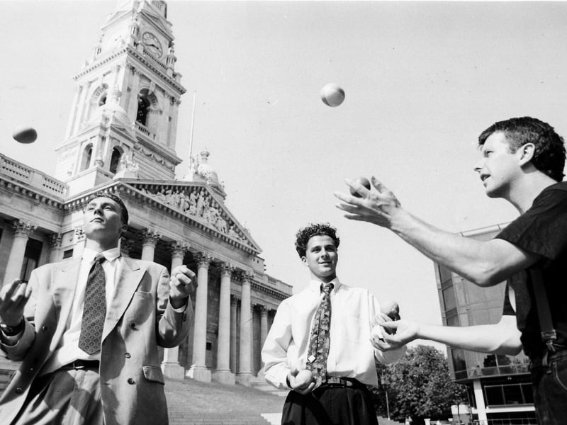 Teenagers learning to juggle outside the Portsmouth Guild Hall on August 28 1990. The News PP3662