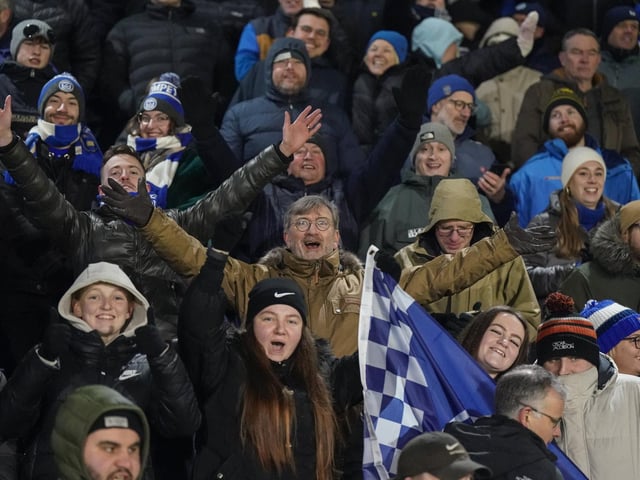 Singing to keep warm at Adams Park.
