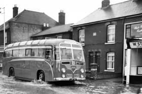Portchester flood
A Southdown coach makes a bow wave through Portchester.