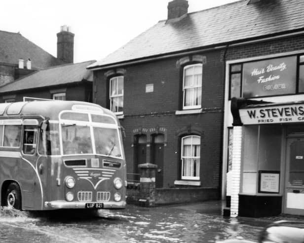 Portchester flood
A Southdown coach makes a bow wave through Portchester.