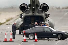 Home Secretary Suella Braverman arrives in a Chinook helicopter for a visit to the Manston immigration short-term holding facility located at the former Defence Fire Training and Development Centre in Thanet, Kent. Picture: Gareth Fuller/PA Wire