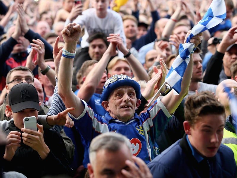 A Pompey fan celebrates the League Two title success at Fratton Park in May 2017. Photo by Harry Murphy/Getty Images