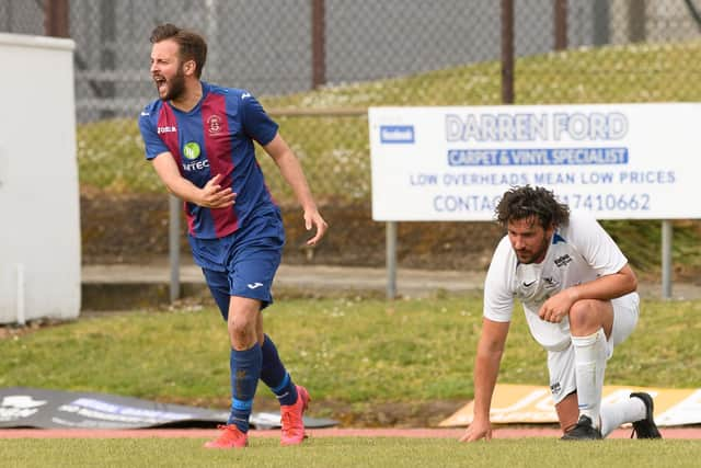 Dec Seiden has just been fouled by Binfield defender Liam Gavin. Picture: Keith Woodland