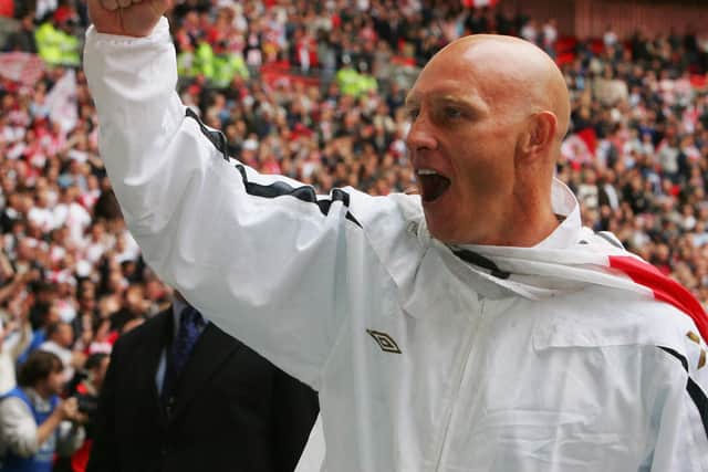 Mark Stimson celebrates after Stevenage Borough had beaten Kidderminster Harriers to win the 2007 FA Trophy. Photo by Phil Cole/Getty Images.