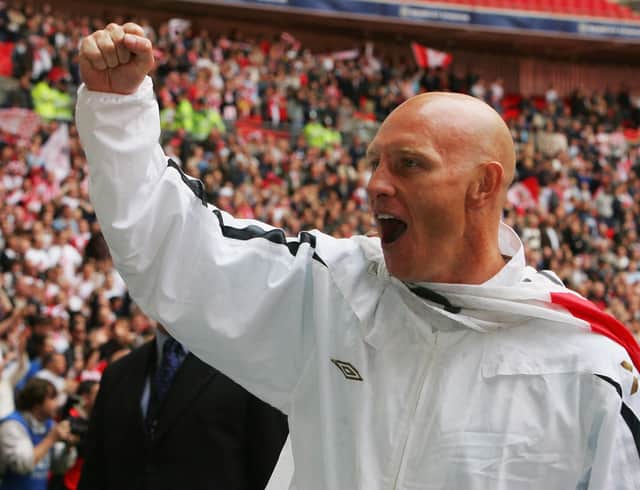 Mark Stimson celebrates after Stevenage Borough had beaten Kidderminster Harriers to win the 2007 FA Trophy. Photo by Phil Cole/Getty Images.